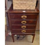 An Edwardian Four drawer music cabinet