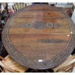 19th century oak gateleg table having later carved decoration ( lacking drawer )