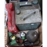 A box containing vintage fuel and oil cans to include Esso, Castrol, etc