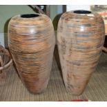 A pair of modern 'colonial' free standing floor vases 65cm tall by repute Liberty's