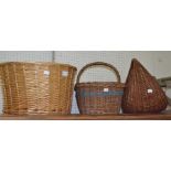 Two vintage wicker shopping baskets and a bicycle basket