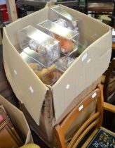 A box containing a large selection of "TY Beany Babies" in original display boxes