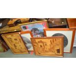 A pair of continental marquetry village scenes with a selection of decorative prints