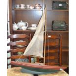 A vintage wooden pond yacht