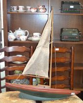 A vintage wooden pond yacht