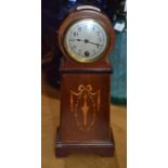 A French balloon mahogany cased mantle clock