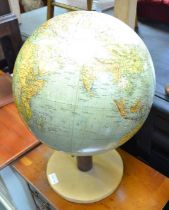 A vintage table top terrestrial globe