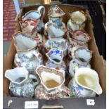 A box of mainly Masons pottery jugs