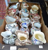 A box of mainly Masons pottery jugs