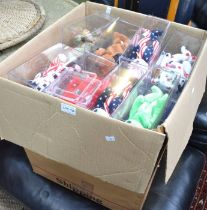 A box containing a large selection of "TY Beany Babies" in original display boxes