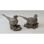 Two silver pheasants, cock 10cm high