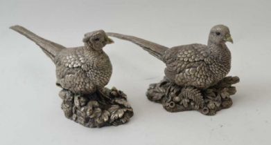 Two silver pheasants, cock 10cm high