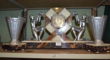 A good quality French Art Deco marble clock garniture with cast metal maidens