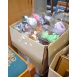 A box containing a large selection of "TY Beany Babies" in original display boxes