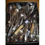Tin of mixed cutlery to include silver examples