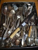 Tin of mixed cutlery to include silver examples