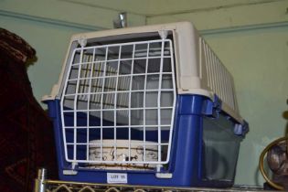 Pet carrier with feeding bowls, leads and collars