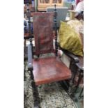 A continental wooden framed open arm rocking chair, with embossed leather seat and back