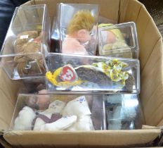 A box containing a large selection of "TY Beany Babies" in original display boxes