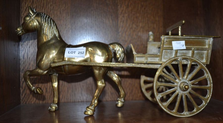 A cast brass horse and cart