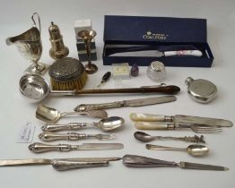 A Georgian silver caster of baluster form, a Georgian silver helmet form jug, a silver Toddy ladle w