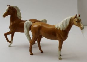 Two Beswick palomino horses (2)