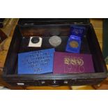 Iron bound box containing some commemorative coins