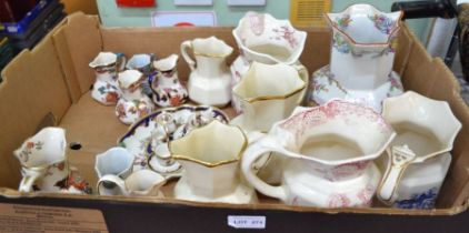 A box of mainly Masons pottery jugs