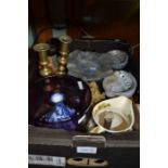 A box containing a selection of useful and collectible items, clocks, brass candlesticks etc