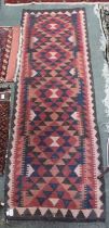 A geometric kilim runner 59 x 184 cm