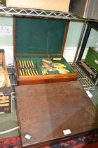 Two large oak part canteens of vintage cutlery