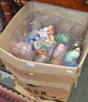 A box containing a large selection of "TY Beany Babies" in original display boxes