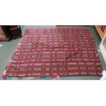 A striped flat weave geometric tent rug part fringed