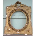 An ornate gilt mirror frame