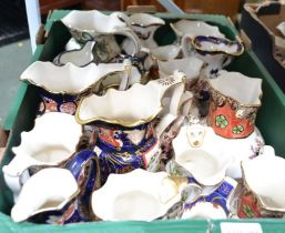 A box of mainly Masons pottery jugs
