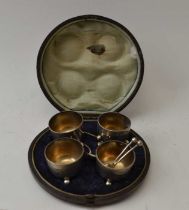 A Victorian cased set of four silver salts & spoons together with a Georgian design meat skewer/lett