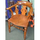 a c19th oak smokers bow armchair