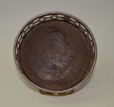 A Victorian silver bottle coaster, pierced gallery with wooden base 13cm dia