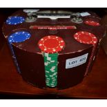 A rotating center piece poker chip and card dispenser