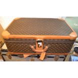 A Louis Vuitton suitcase, 80cm x 53cm x 26cm