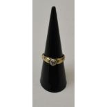 A Victorian solitaire diamond ring, gold coloured band, gross weight: 2.3g, ring size: 'L1/2'
