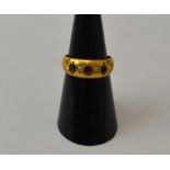 An Edwardian ruby & diamond ring, inset to an 18ct gold band, gross weight: 3.6g, ring size: 'L1/2'