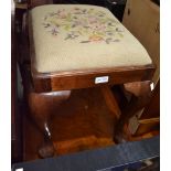 A cabriole leg stool with wool work top
