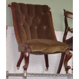 A 19th century green upholstered nursing chair