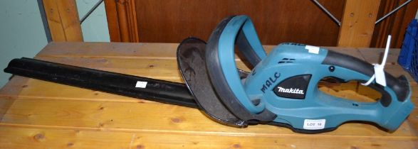 A Makita DUH523 battery hedge trimmer