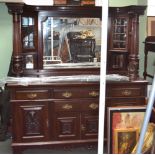 A large mahogany mirror backed sideboard with twin columns