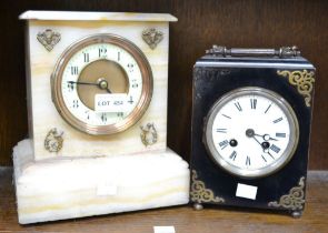 A white marble clock with a black wooden mantle clock