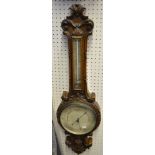 Carved oak barometer/thermometer