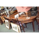 A George III mahogany "D" ending dining table