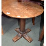 A 19th century small round occasional oak table